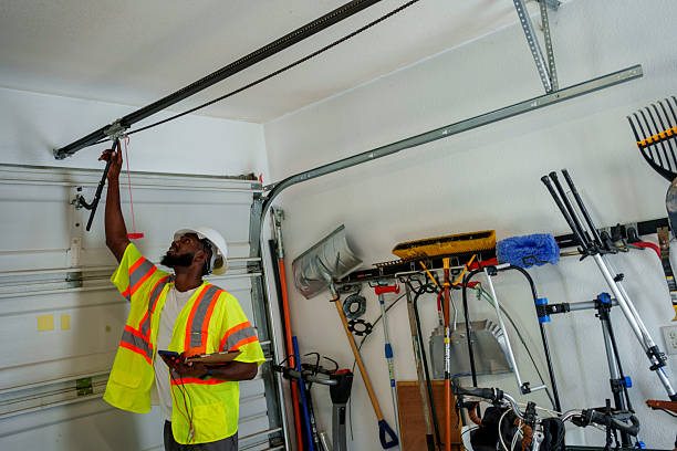 Professional Garage Door Panel Replacement technician working in Hopkins County County, TX